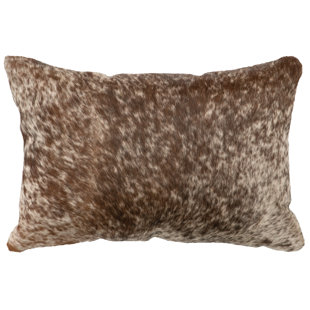 Coussin brun foncé moucheté