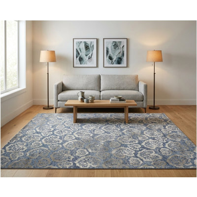 Tapis bleu denim moderne touffeté à la main avec motif floral botanique