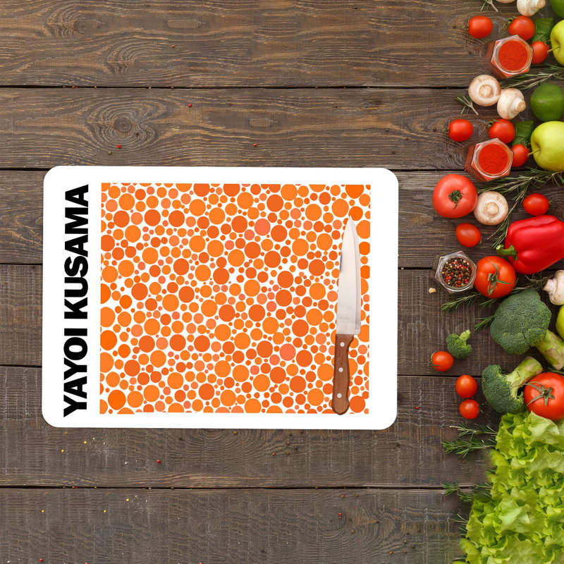 Planche à découper en verre trempé vibrant à motif orange à pois, idéale pour les cuisines modernes et les espaces de préparation des aliments élégants