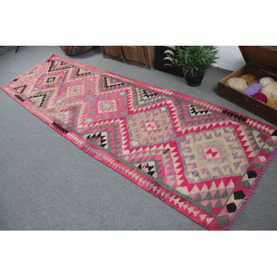 Handwoven Vintage Turkish Runner Rug with Tribal Geometric Design in Vivid Pink for Home Decor