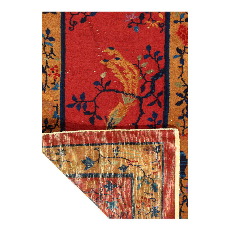 Muhyiddin Oriental Area Rug in Rust