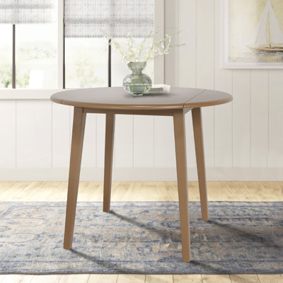 Layce Extendable Round Solid Wood Dining Table