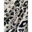 Tapis noir / beige en peau de vache à imprimé léopard novateur