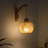 Anniek Rattan Swing Armed Sconce