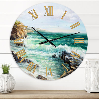 Cliff donnant sur les vagues sauvages de l'océan - horloge murale nautique et côtière