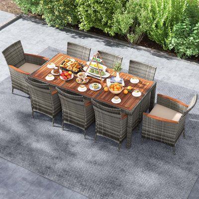 9 Pieces Outdoor Wicker Dining Set With Acacia Wood Table And 8 Armchairs