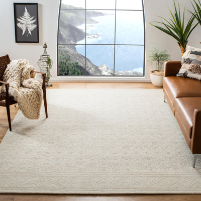 Setzer Southwestern Handmade Tufted Wool Ivory Area Rug