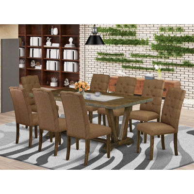 Ensemble de 9 pièces avec un magnifique plateau de table de cuisine Jacobean patiné et 8 chaises Parson beige brun avec têtes de clous et finition jacobine capitonnée et patinée.
