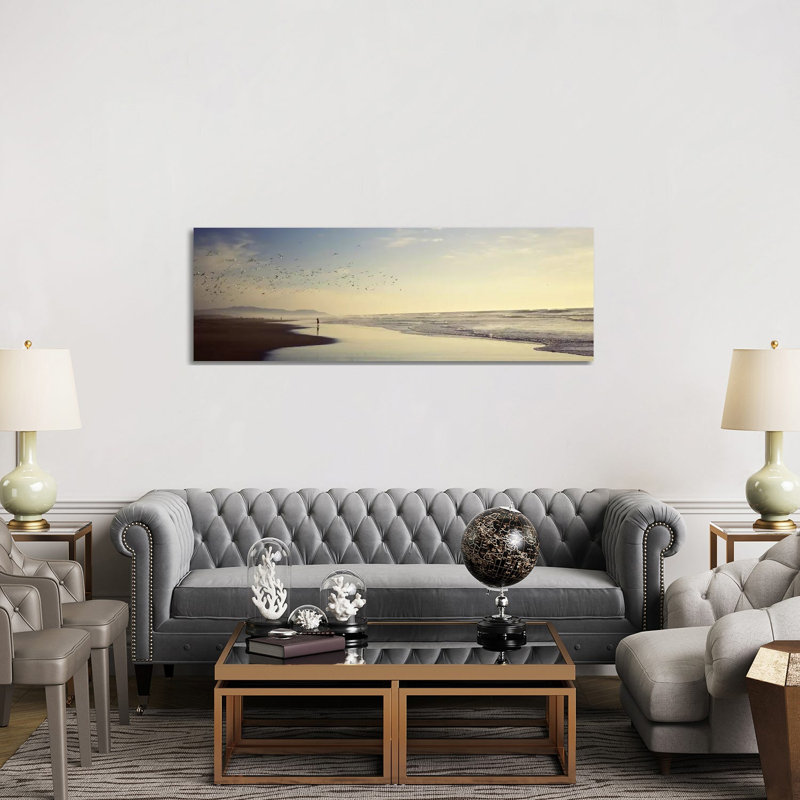 Flock Of Seagulls Flying Above A Woman On The Beach, San Francisco, California, USA - Wrapped Canvas Panoramic Print