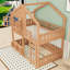 Lit superposé en bois avec toit de style maison-176350433