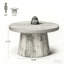 Table basse ronde à cannelures avec base cylindrique