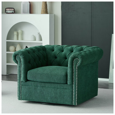 Fauteuil club pivotant Chesterfield avec garniture cloutée, revêtement en tissu vert foncé, rotation à 360 degrés, structure en bois massif