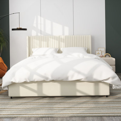 Lit plateforme tapissier haut de gamme avec rangement breveté à 2 tiroirs offrant confort, style et fonctionnalité à votre chambre à coucher.