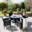 Dubose 4 - Person Wicker Patio Dining Set with Round Table , Cushions Included-128712914-37961050