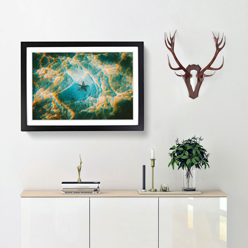 A Starfish on the Ocean Floor - Picture Frame Graphic Art Print, 48cm H x 65cm W x 2cm D, Black Framed