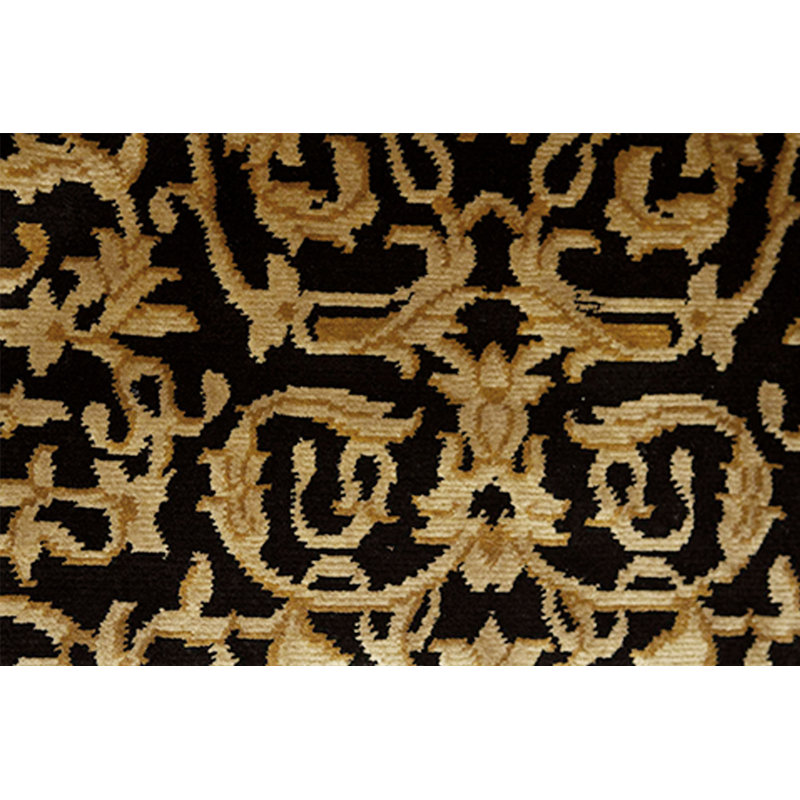 Tapis noir et doré de haute qualité noué à la main