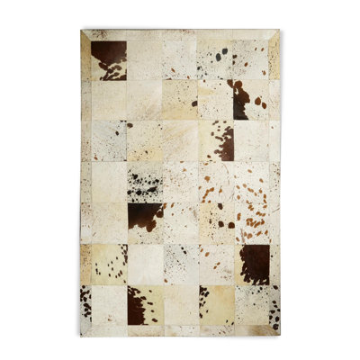 Beige Cowhide Rug With Brown Cow Print