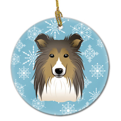 Ornement figurine suspendu en céramique flocon de neige sheltie