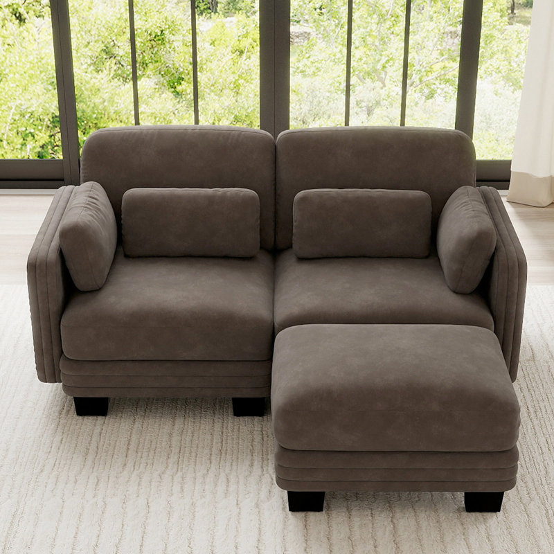 Canapé d'angle modulaire 2 places au design moderne et minimaliste capitonné, avec pouf amovible et coussins d'assise épais et confortables, idéal pour le salon et la chambre.