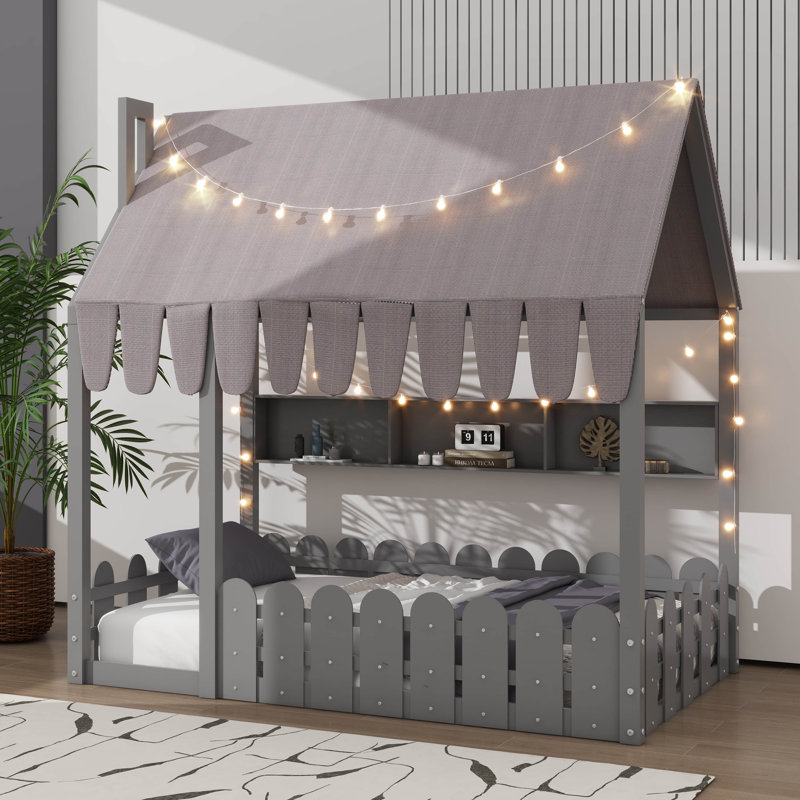 Lit de sol pour enfants de style Montessori équipé d'une barrière de sécurité, d'un auvent, d'un éclairage et de trois unités de rangement