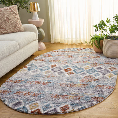Tapis bleu rouille / ivoire Evangelyn