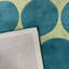 Tapis vert clair / bleu sarcelle touffeté à la main
