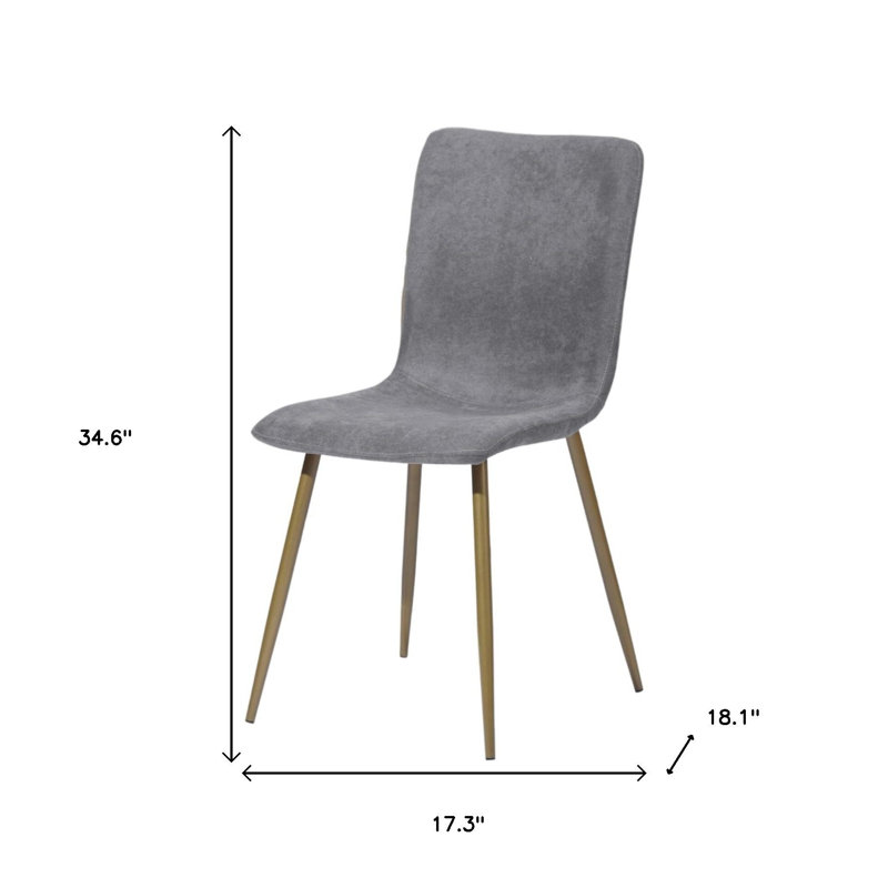 Ensemble de quatre chaises d'appoint de salle à manger rembourrées en tissu gris foncé et or