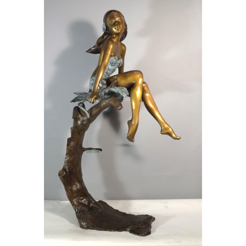 Girl sitting on maple
