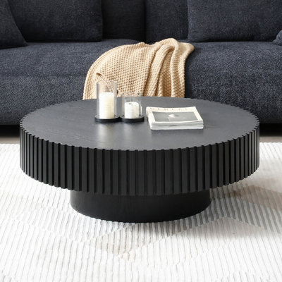 Table basse ronde moderne en bois avec base piédestal