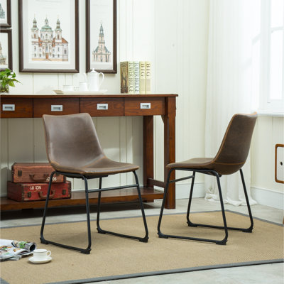 Antique Brown Pu Leather Chair , Vintage Style, Plastic Seat, Black Iron Frame, 18.5"W X 22.25"D 31.5"H 2 Dining Chairs, Brown. Hand Crafted Metal. Comfortable Molded Seats.
