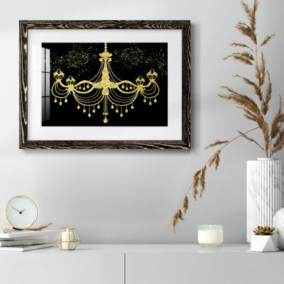 Lustre doré encadré sur papier