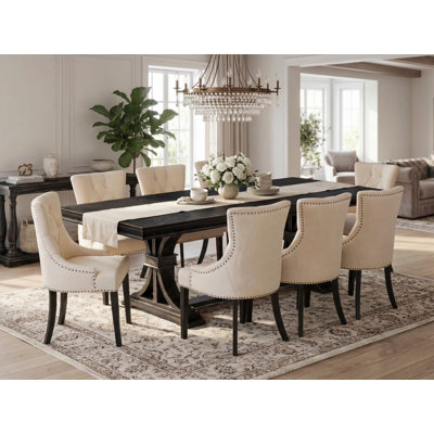 9-piece dining set includes a breakfast table and 8 Light Beige Linen Fabric kitchen chairs & black legs with Button Tufted Back - Sand Blasting Black finish.