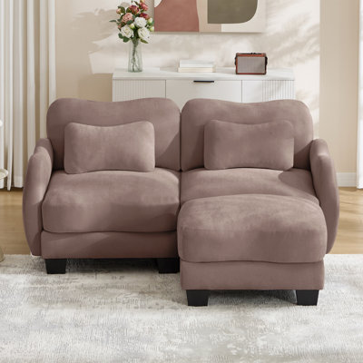 Causeuse avec repose-pieds mobile