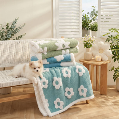 Water-Resistant Pet Blanket for Medium to Large Dogs. Washable. Features a Plush, Thick Jacquard Shag Fleece with a Warm Sherpa Lining. 3D Textured Flower Print. Provides Couch Protection for Cats and Puppies. Color: Blue. Dimensions: 40x28 Inches.
