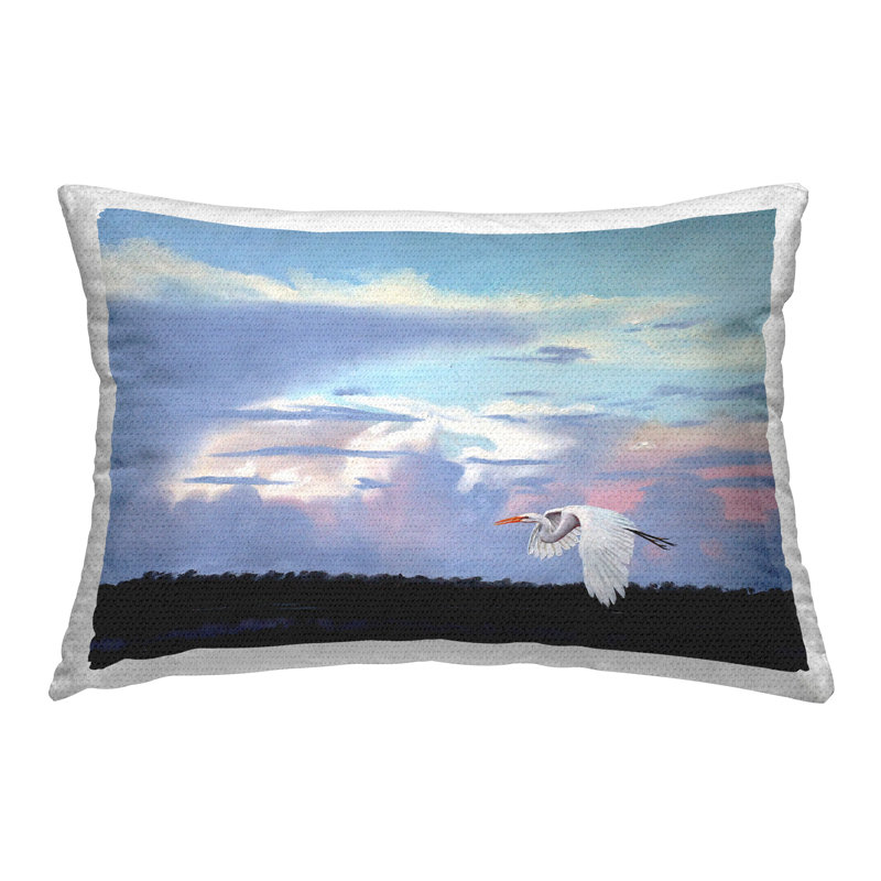 Heron Flying Through Clouds Printed Outdoor Throw Pillow Design by D. Rust