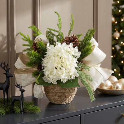 Holiday Hydrangea Arrangement with Evergreen and Bows in Rope Pot