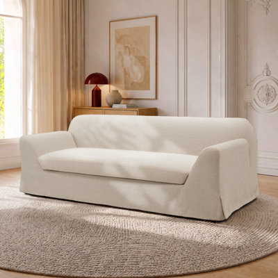 Nuvora 87" Modern Deep Seat Upholstered Skirted Sofa,  Slope Arm Coastal Couch, Seats 3 for Living Room, Fully Assembled