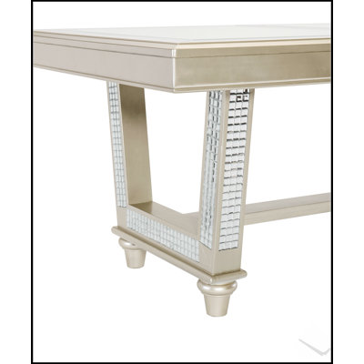 Glamorous Trestle Dining Table with Glass Insert Top and Decorative Extension Leaf in Champagne Finish