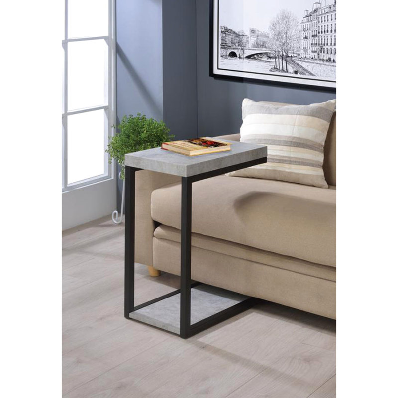 Table à collation moderne en ciment et noire, pratique et pratique pour l'esthétique du salon