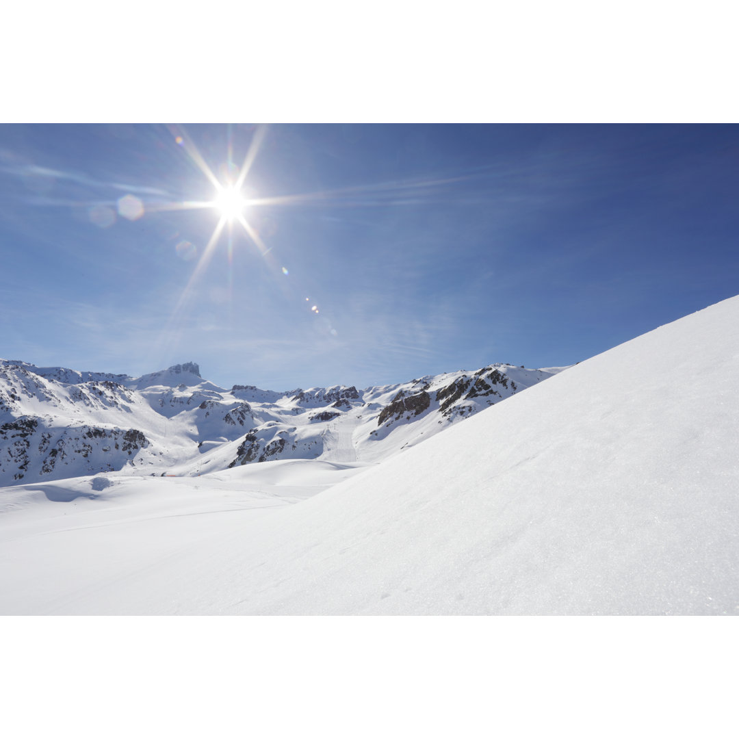 Leinwandbild View Past Snowy Hill von AscentXmedia