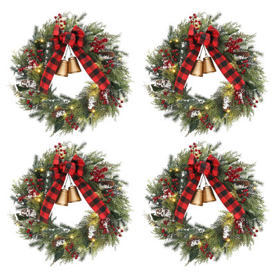 2 paquets / 3 paquets / 4 paquets de couronne de Noël pré-éclairée de 24 pouces avec clochettes et arc, 20 lumières DEL rouges et vertes, 8 modes d'éclairage, décoration de Noël à piles pour porte, fenêtre, manteau de cheminée, intérieur et extérieur