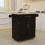 Chariot à roulettes pour îlot de cuisine avec 1 tiroir et 2 portes avec tablettes réglables, porte-serviettes et plateau en bois d'hévéa - noir