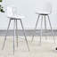 Tabourets de bar transparents modernes Breion avec siège en similicuir et pieds en métal (ensemble de 2)-365133028