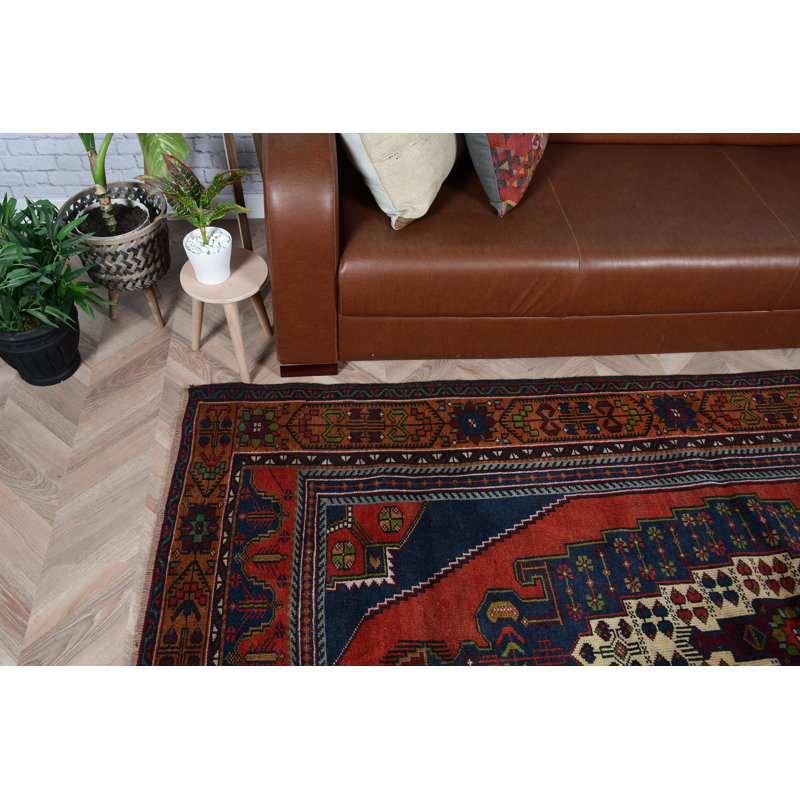 Tapis turc fabriqué à la main avec un motif géométrique rouge et bleu vibrant pour une décoration traditionnelle