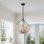 Lustre 4 lumières E12 en métal noir mat + rotin, abat-jour beige, intensité variable, ETL, chaîne réglable **