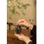Swirling flowers on black Incense Burner