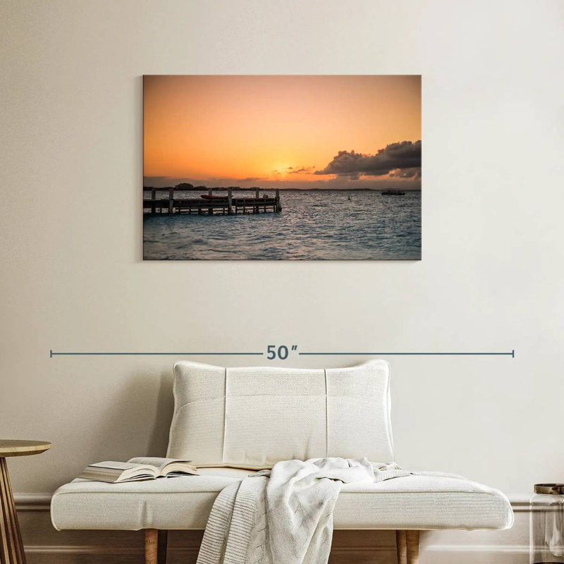 Sunset over wooden dock Aletra
