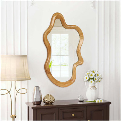 Miroir mural de forme irrégulière avec cadre en bois