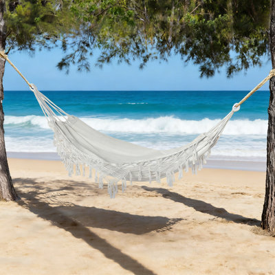Très grand hamac boho avec frange en macramé pour une détente intérieure et extérieure, comprend un sac de transport portable.