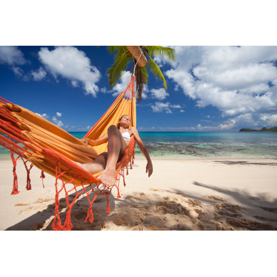 Woman Under Palm Tree by Amriphoto
